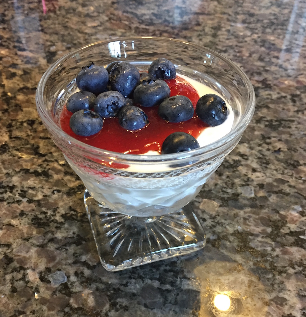 homemade yogurt with strawberry jam and blueberries